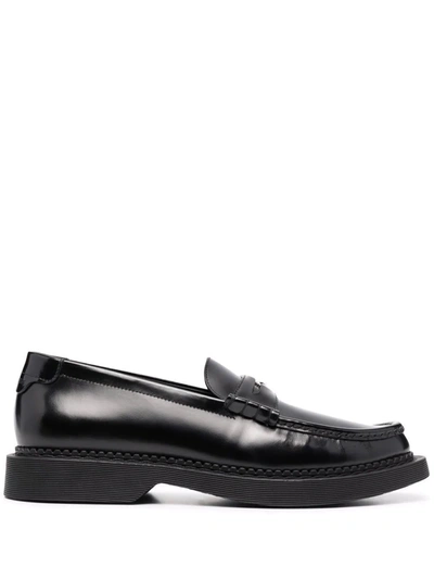 Shop Saint Laurent Teddy Penny Leather Loafers In Black