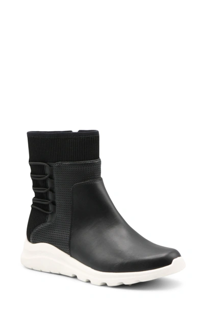 Shop Adrienne Vittadini Tabby Perforated Strap Shaft Sock Boot In Black Knit