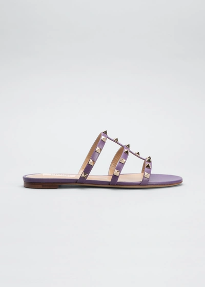 Shop Valentino Rockstud Leather T-strap Flat Sandals In Violet