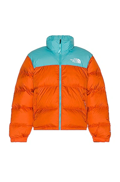 Shop The North Face 1996 Retro Nuptse Jacket In Red Orange & Transantarctic Blue