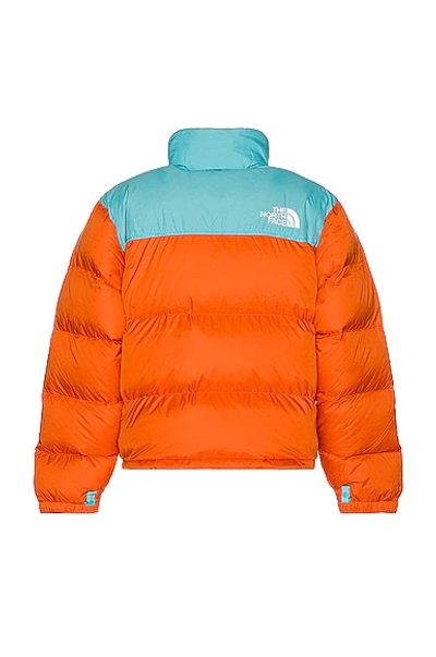 Shop The North Face 1996 Retro Nuptse Jacket In Red Orange & Transantarctic Blue