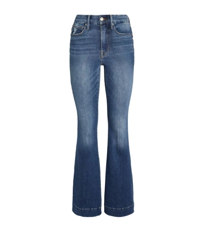 Shop Good American Good Legs Flared Jeans In Blue