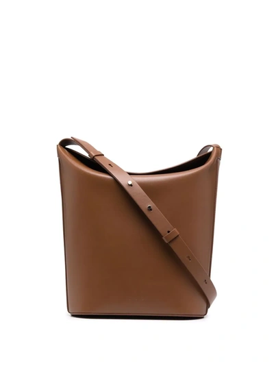 Shop Aesther Ekme Sway Bucket Bag In Braun