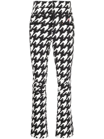 Shop Perfect Moment Houndstooth Flared Trousers In Schwarz