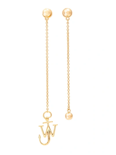 Shop Jw Anderson Logo Pendant Asymmetric Drop Earrings In Gold