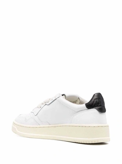 Shop Autry White Leather Sneakers With Black Heel Tab In White/black