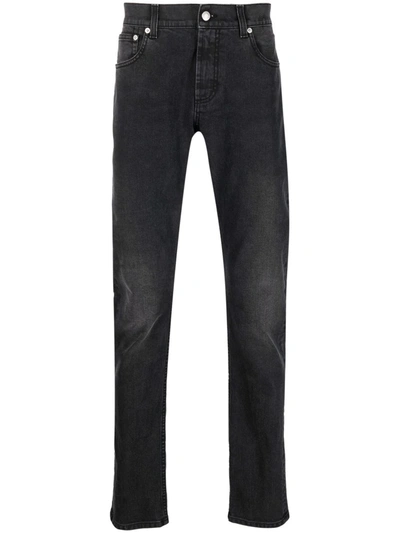 Shop Alexander Mcqueen Skinny-cut Denim Jeans In Black