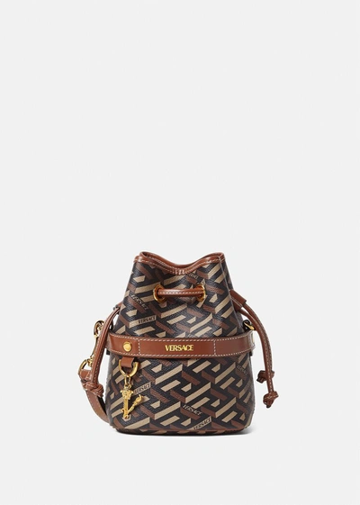 Shop Versace La Greca Signature Mini Bucket Bag In Black+caramel