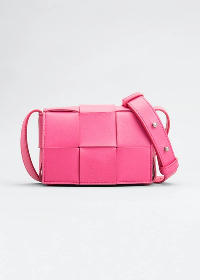 Shop Bottega Veneta Mini Cassette Woven Crossbody Bag In Pink