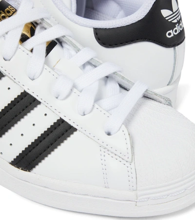 Shop Adidas Originals Superstar Leather Sneakers In Ftwwht/cblack/ftwwht