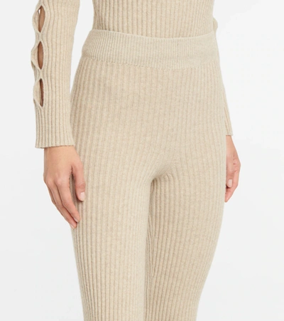 Shop Victoria Beckham Ribbed-knit Wool-blend Flared Pants In Off White Melange