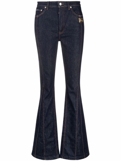 Shop Dolce & Gabbana Flared Jeans With Logo Plaque In Blue