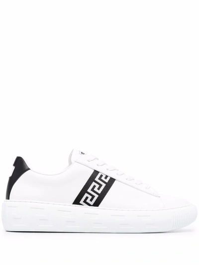 Shop Versace Greca Striped Sneakers In White