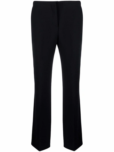 Shop Versace Mid-rise Flared Trousers In Black