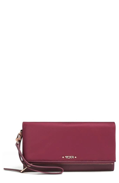 Shop Tumi Travel Wallet In Berry