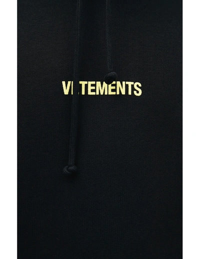 Shop Vetements Logo Label Hoodie In Black
