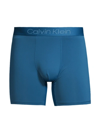 Shop Calvin Klein Moisture Wicking Boxer Briefs In Krypton