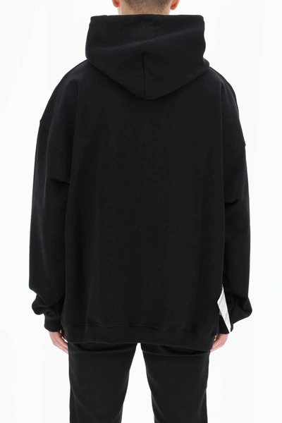 Shop Vetements Logo Label Maxi Hoodie In Black