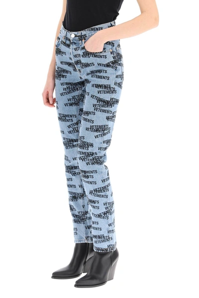 Shop Vetements Monogram Print Jeans In Mixed Colours