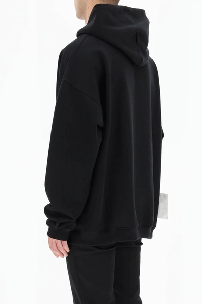 Shop Vetements Logo Label Maxi Hoodie In Black