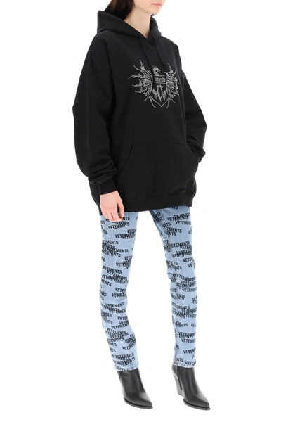 Shop Vetements Monogram Print Jeans In Blue,black