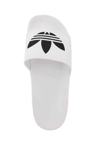 Shop Adidas Originals Adilette Lite Slipper In White,black