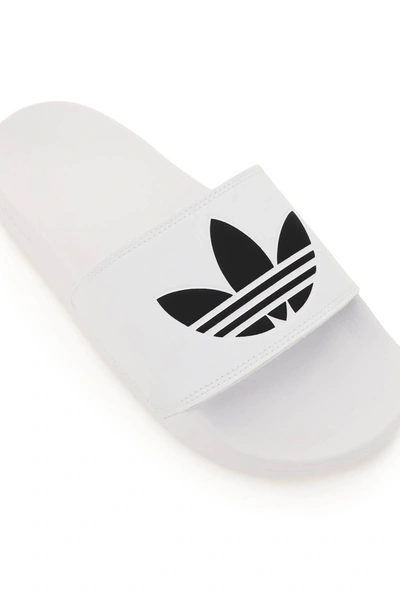 Shop Adidas Originals Adilette Lite Slipper In White,black