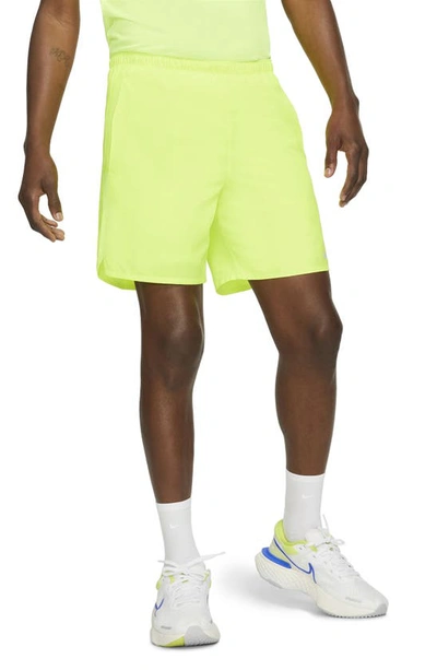 Shop Nike Dri-fit Challenger 2-in-1 Running Shorts In Volt