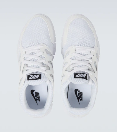 Shop Nike Free Run 2 Sneakers In White/black-pure Platinum