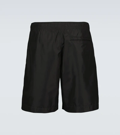 Shop Givenchy Printed Swim Shorts In Black/white