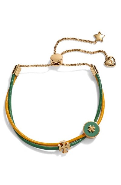 Shop Tory Burch Kira Slider Bracelet In Gold / Patina / Gldn Crest