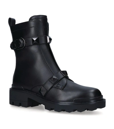 Shop Valentino Leather Roman Stud Combat Boots In Black