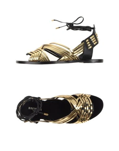 Shop Balmain Sandals In Gold