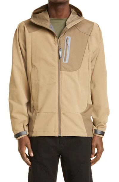 And Wander Water Repellent Stretch Shell Jacket In Beige