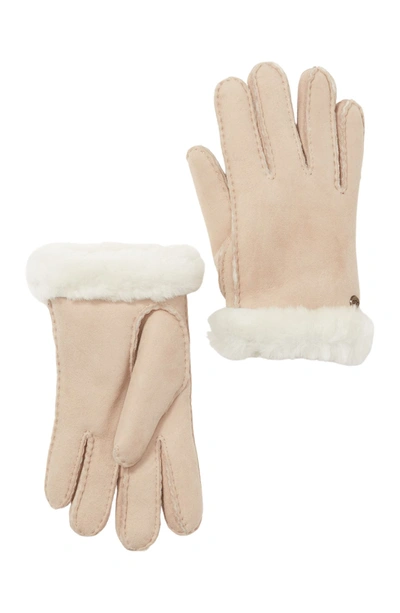 Shop Ugg Genuine Dyed Shearling Slim Side Vent Gloves In Sand