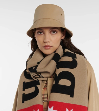Shop Burberry Reversible Checked Cotton Bucket Hat In Honey