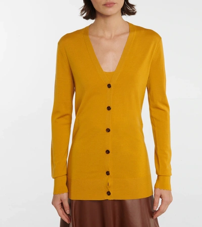 Shop Chloé Longline Wool Cardigan In Yellow