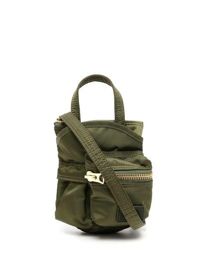 Shop Sacai Small Pocket Crossbody Bag In Green