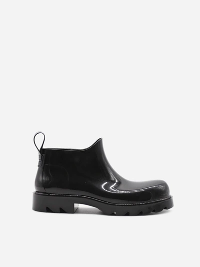 Shop Bottega Veneta Stride Ankle Boots In Shiny Rubber In Black