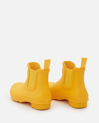 Shop Hunter Chelsea Rubber Boots In Yellow