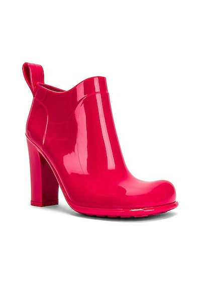 Shop Bottega Veneta Rubber Ankle Boots In Lollipop