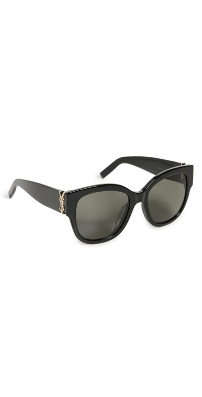 Shop Saint Laurent Oversized Cat Eye Sunglasses In Shiny Black