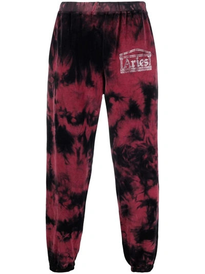 Shop Aries Tie-dye Cotton Track Trousers In Black