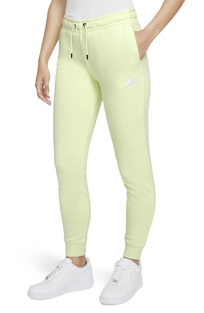 Shop Nike Sportswear Essential Fleece Pants In Lime Ice/ White