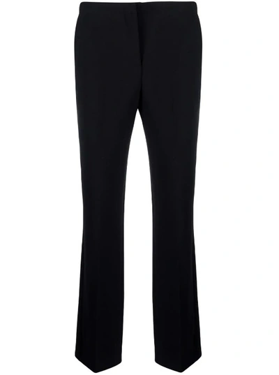 Shop Versace Black Mid-rise Flared Trousers
