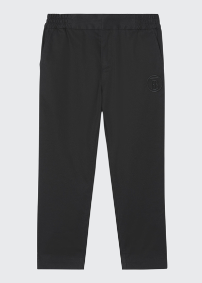 Shop Burberry Boy's Leonard Solid Tb Embossed Chino Pants In Black