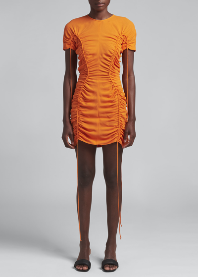 Shop Stella Mccartney Ruched Drawstring Mini Dress In 7501bright Orange