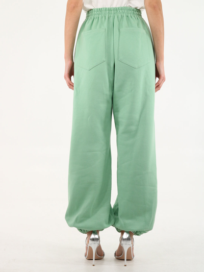 Shop Attico Carter Green Joggers