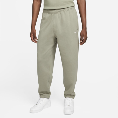 Shop Nike Men's Solo Swoosh Fleece Pants In Green