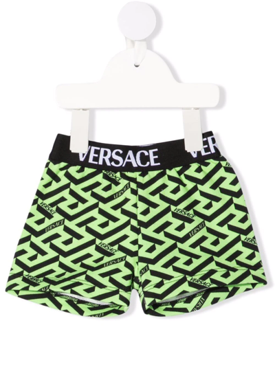 Shop Versace Greca Print Shorts In Green